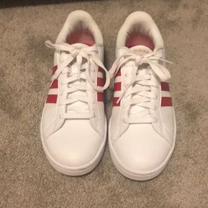 Red and white Adidas Sneakers.